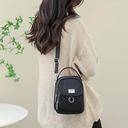 ONYX ESSENTIALSโข NYLON CROSSBODY BAG