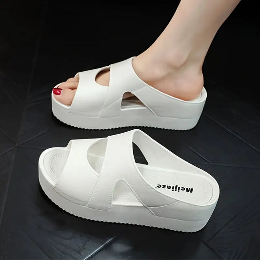 LEVIรโข WOMEN'S SLIP-ON WEDGE SANDALS
