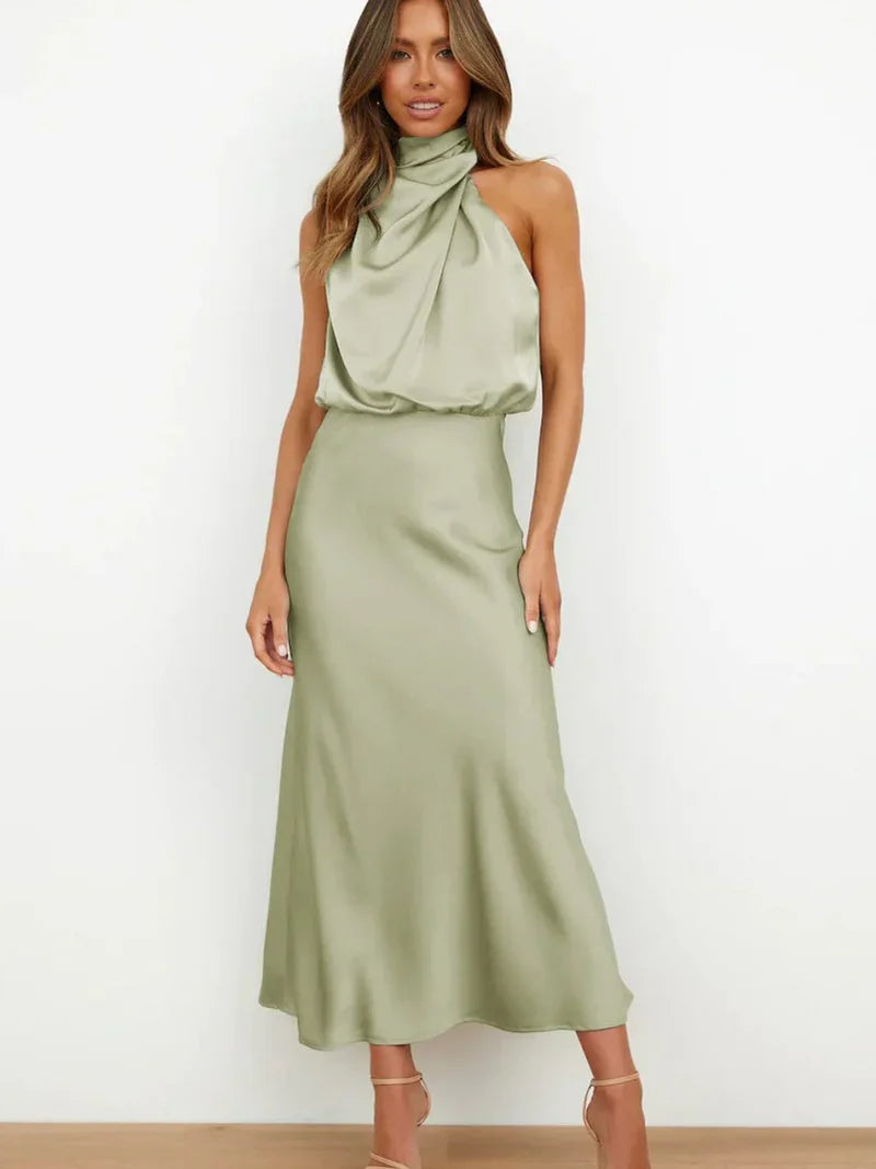 SLEEVELESS LONG DRESS WITH ASYMMETRICAL NECKLINE AND REFINED STYLE