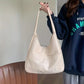 EMILIA™ SOLID COLOR HOBO BAG